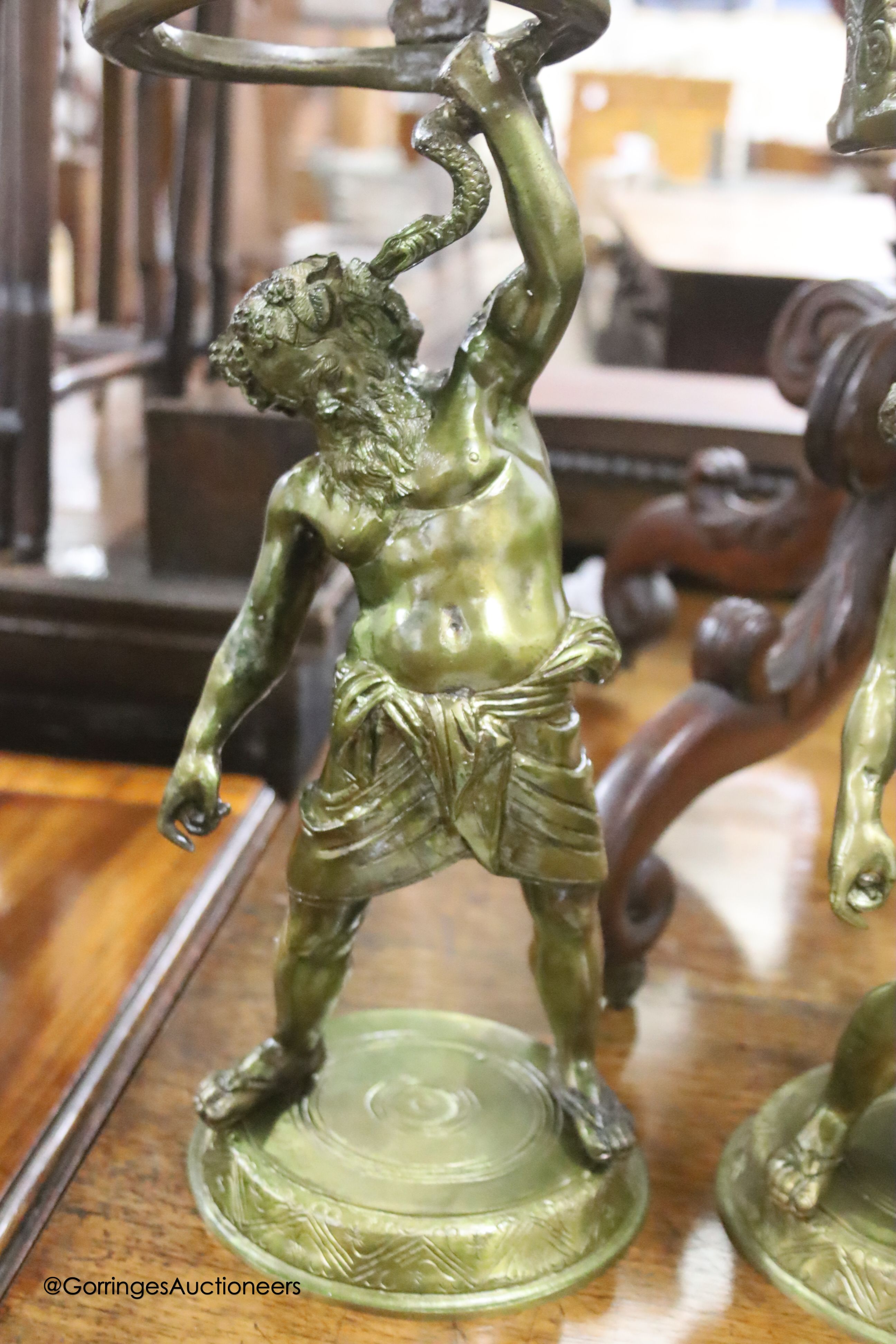 Six cast gilt metal figures of Hercules, height 42cm